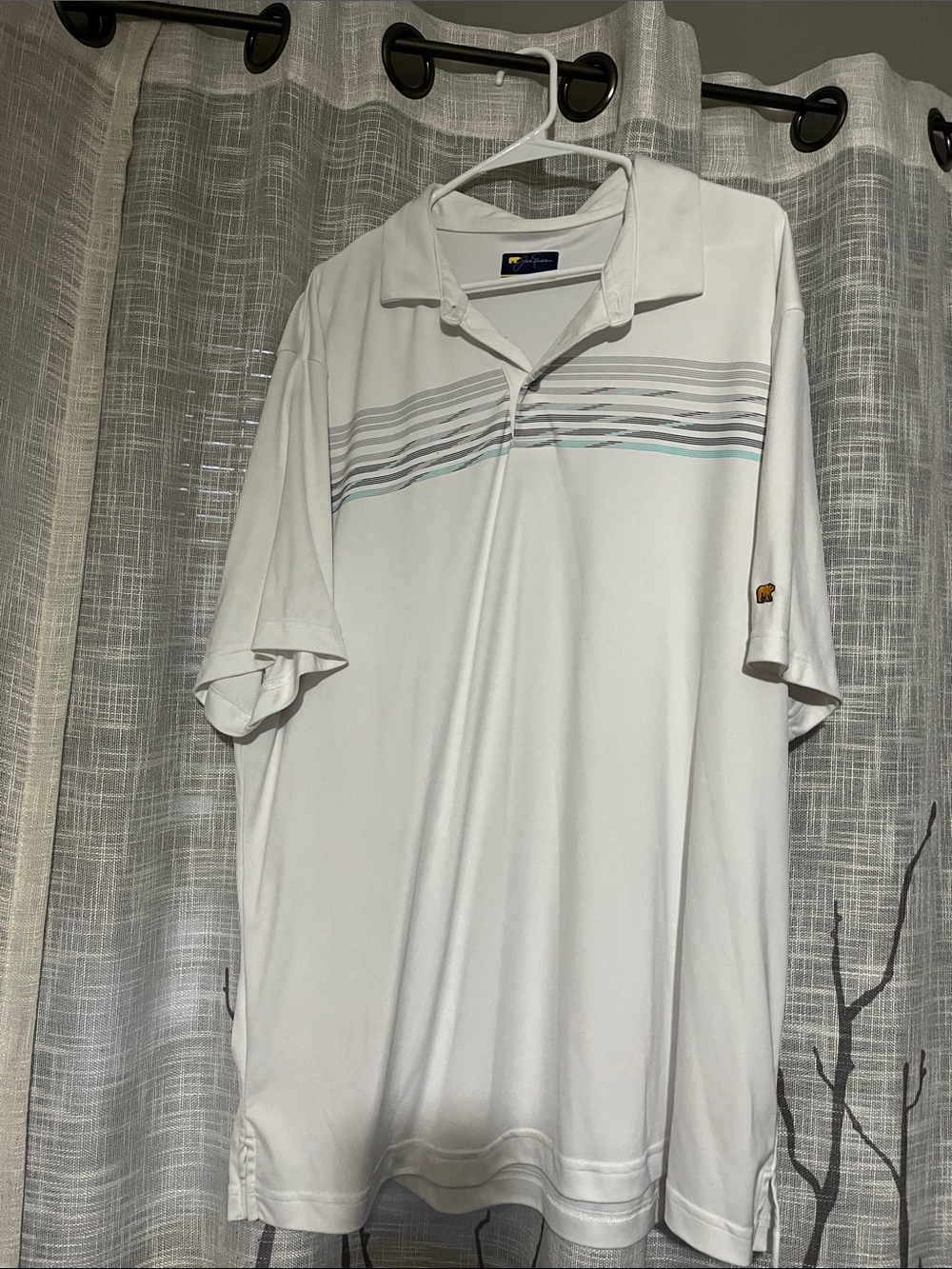 White Short-Sleeve Polo Shirt with Subtle Stripe Jersey Material